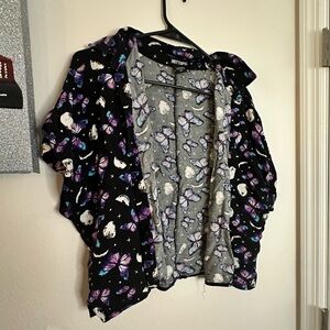 Butterfly print jacket with a black and purple colour scheme